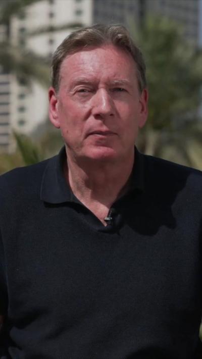 BBC Correspondent Frank Gardner wearing black polo shirt