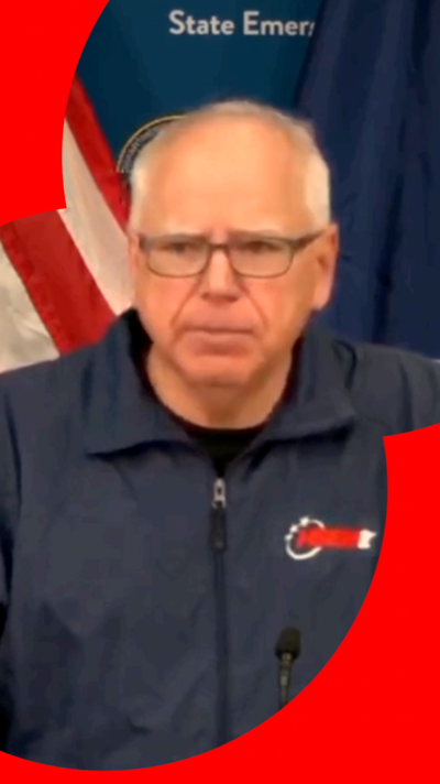 Tim Walz, Governor of Minnesota, speaks to reporters