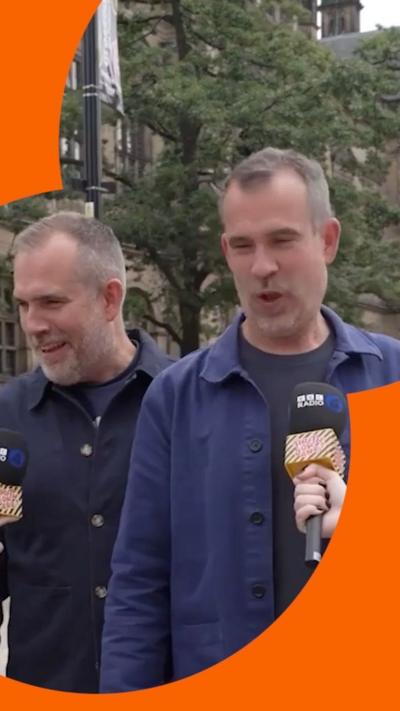 Doctors Chris and Xand stand outside the Fringe.