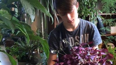 Joe Bagley with his houseplants