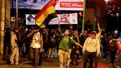 Crowds gathered in the capital, La Paz, after Evo Morales was declared winner of Sunday's election.