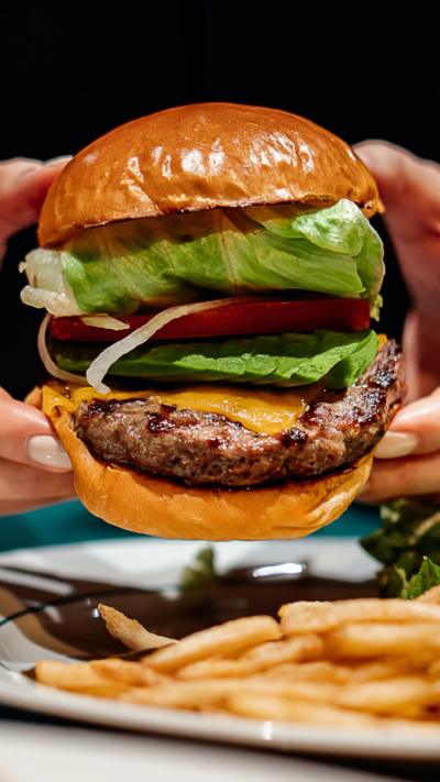 Beef burger with salad in a bun