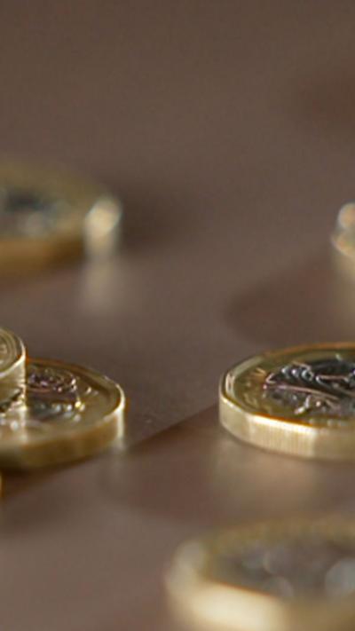 £1 coins on a table