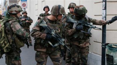 Soldiers operate in Saint-Denis, a northern suburb of Paris