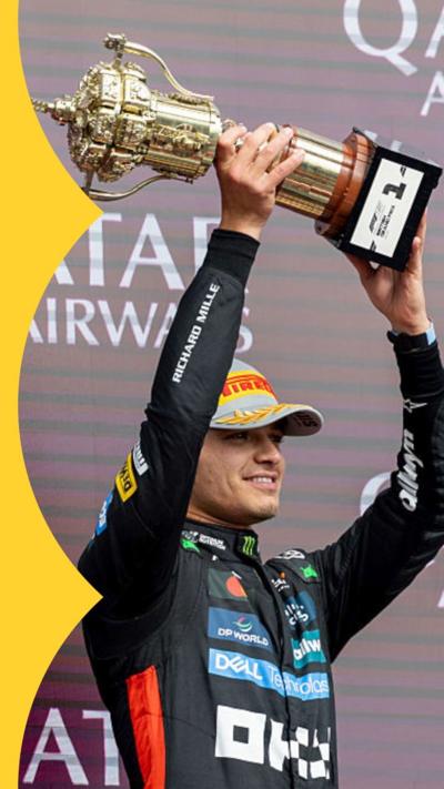 Lando Norris of the United Kingdom and Team McLaren holds up a trophy to celebrate his win at Silverstone on 6 July 2025