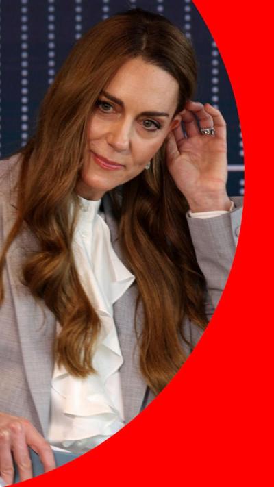 Kate Middleton wearing a white top and a grey jacket.