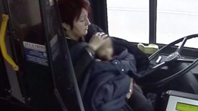 Toddler with bus driver