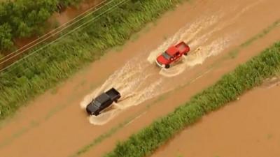 Cars driving in water