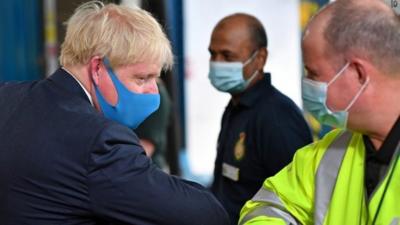 Boris Johnson and ambulance worker