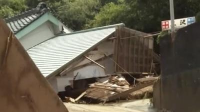 Home damaged by Tropical Storm Meari in central Japan