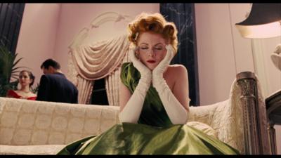 Still from Coen brothers film, woman in green dress