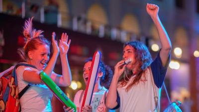 Russia fans celebrate near Red Square, 19 June