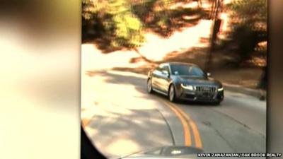 Car driving backwards on LA's Mulholland Drive - Kevin Zanazanian/Oak Brook Realty