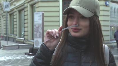 Woman smelling "scent of terror"