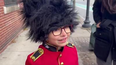 Boy dress as member of King's Guard