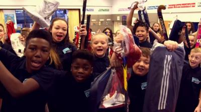 Children getting sports kit from Reclaim Sport