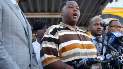 Cameron Sterling outside the Triple S Food Mart, where his father was killed, in Baton Rouge, La., Wednesday, 13 July 2016.