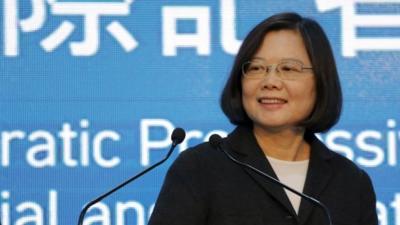 Democratic Progressive Party (DPP) chairperson and presidential candidate Tsai Ing-wen announces her election victory