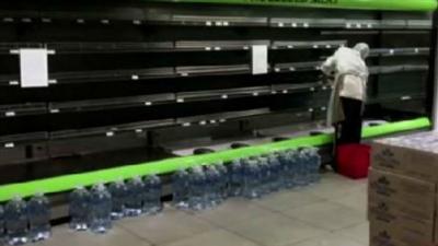 Empty shelves in supermarket