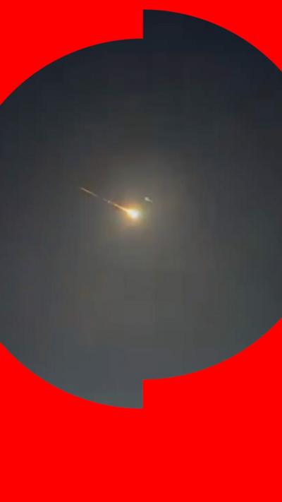 A bright meteor flying through the sky