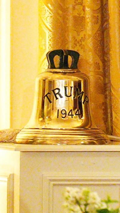 Golden coloured bell with Trump 1944 written on it