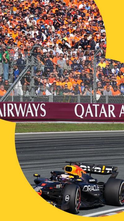 Car drives past a stand at the Dutch Grand Prix