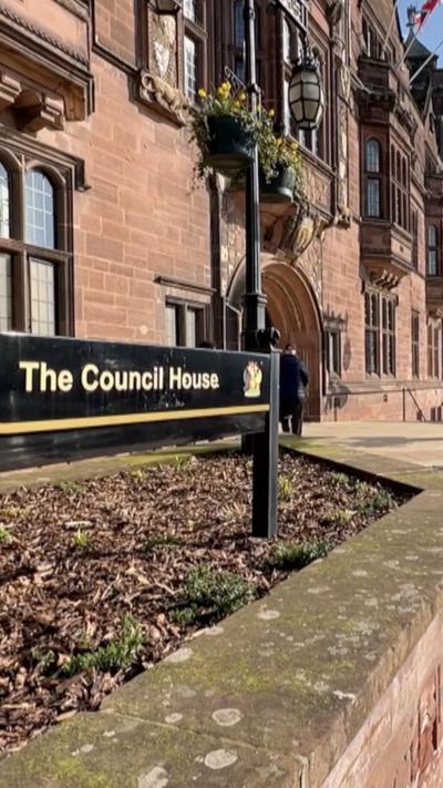 The red brick exterior of a council office