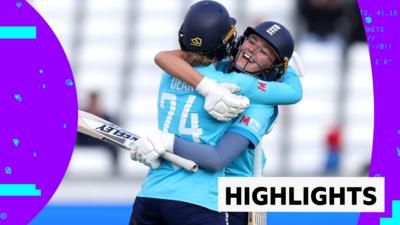 Charlie Dean and Tilly Corteen-Coleman hug each other celebrating