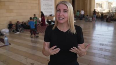 anna foster in Beirut with children in background