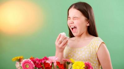 Girl sneezing
