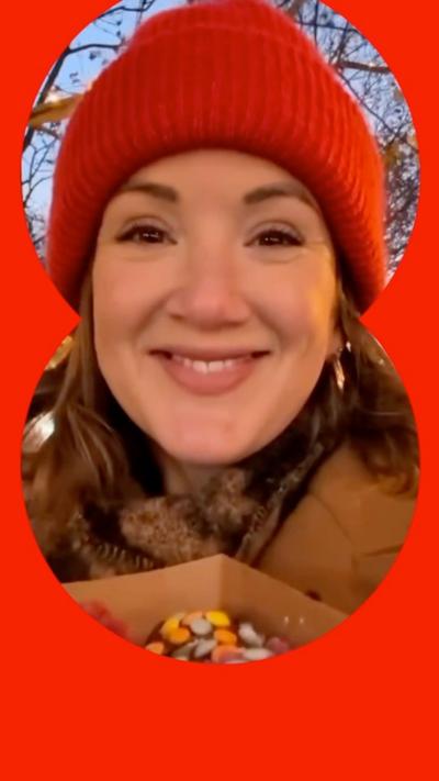 A woman wearing a red hat 