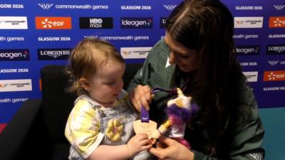 Bethany Firth with daughter Charlotte after winning a bronze medal