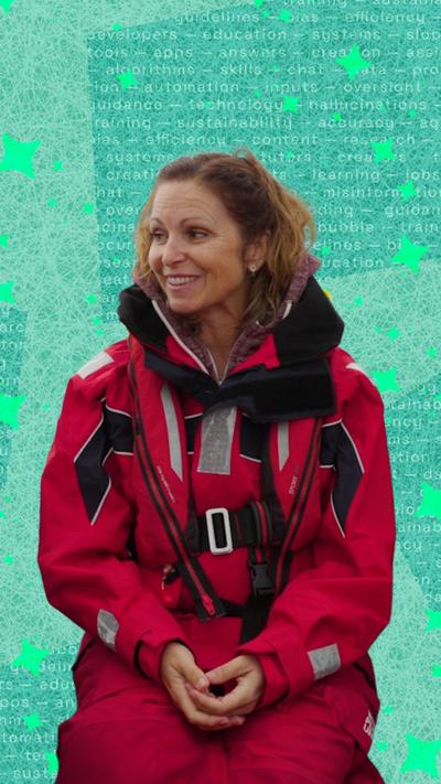 Woman in waterproof sailing clothes