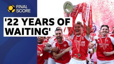 Arsenal celebrate winning the 2025-26 Premier League by lifting their trophy