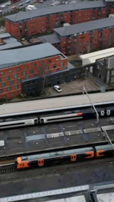Aerial view of railway station and tracks