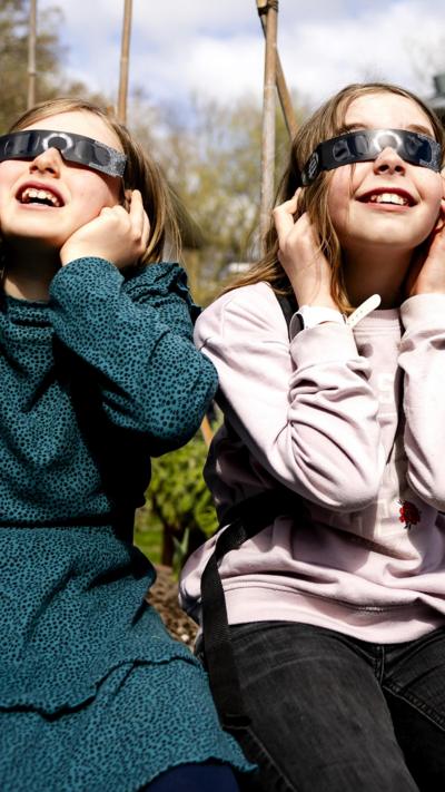 Two children wearing protective eyewear