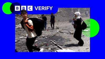 A photo of Palestinians in Gaza City with an outline of the BBC Verify colours and logo.