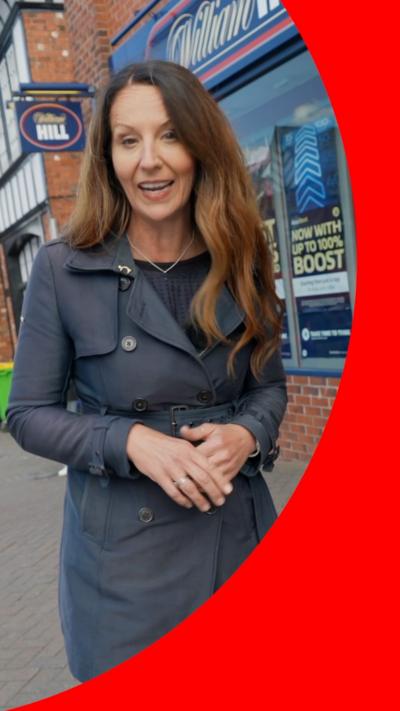 BBC reporter Alison Freeman stands in Makerfield's high street 