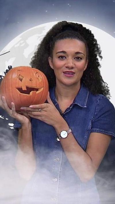 Nina with a Halloween pumpkin