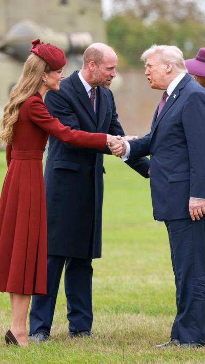 Trump shakes hands with Catherine next to Prince William