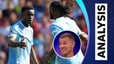 Manchester City's Marc Guehi and Antoine Semenyo high five while Joe Hart smiles