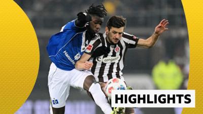 Fabio Balde of Hamburger SV battles for possession with Adam Dzwigala
