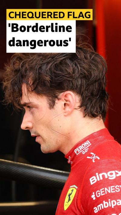 Charles Leclerc wears Ferrari race suit 
