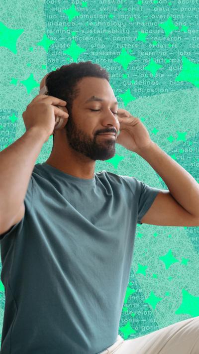 Man sits cross-legged with headphones on and his eyes closed