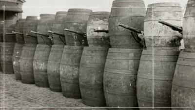 Guns behind barrels