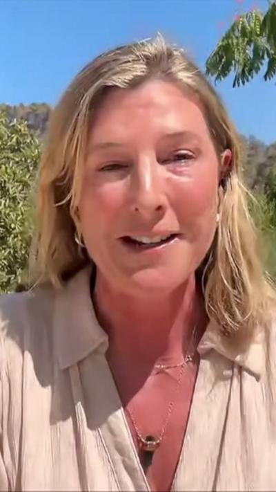 Jo Barnes speaking from France outdoors