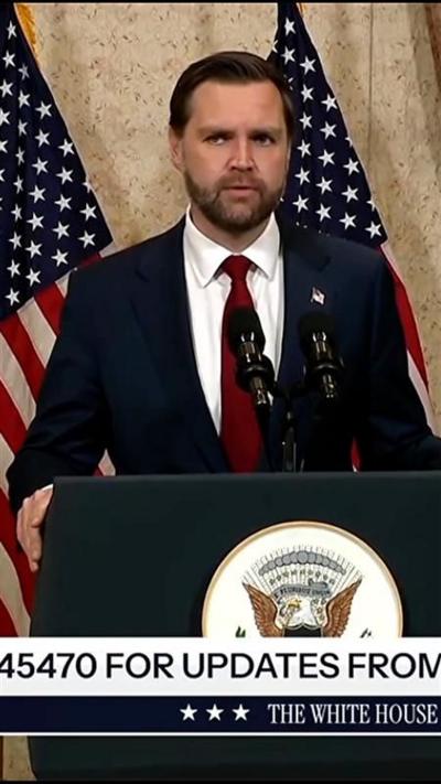 JD Vance at a podium.