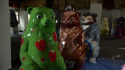 Three bear statues