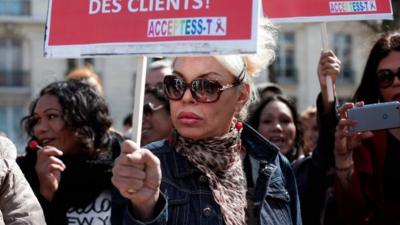 French sex workers protest against a new bill outlawing payment for sex