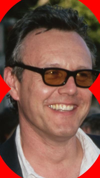 Anthony Head smiling and wearing sunglasses